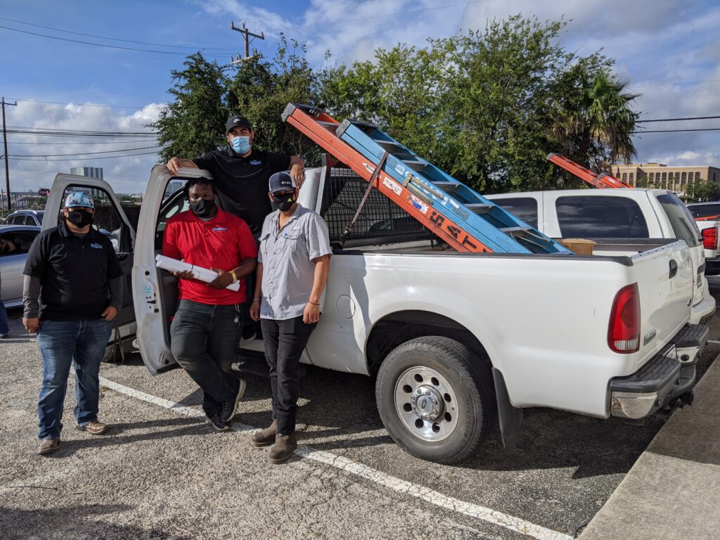 IT and cabling technicians providing safe technical support for businesses during COVID.